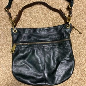Fossil leather convertible strap handbag. Hobo style. Black with brown accents.